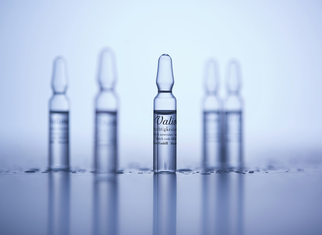 a group of small bottles sitting on top of a table