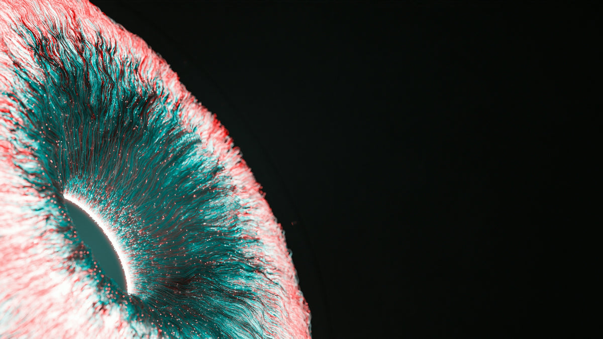 A close up of an apple with a black background