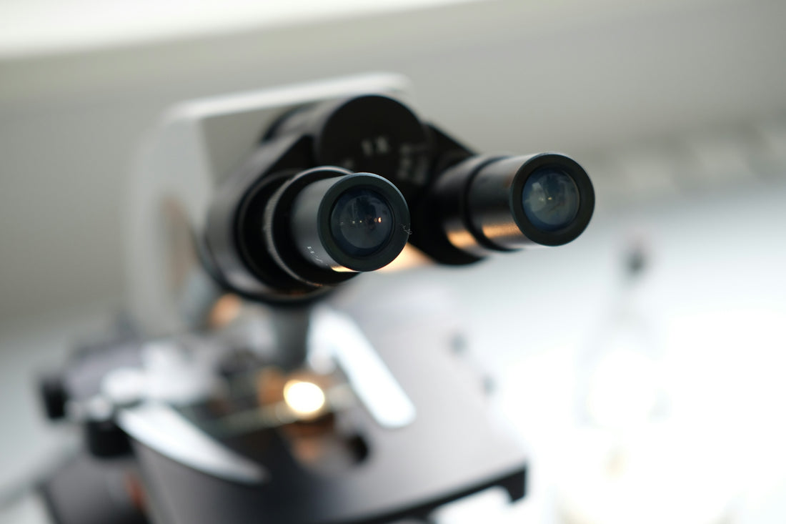 A close up of a camera on a tripod